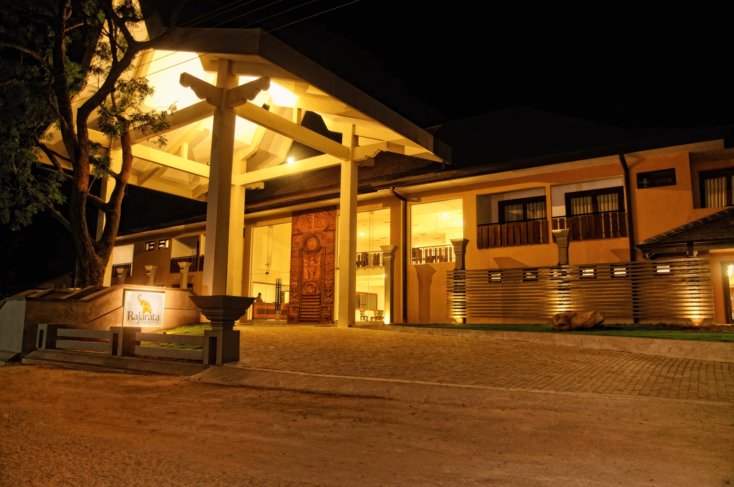 Rajarata hotel exterior at night